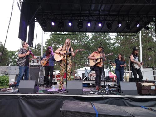 Maygen and the Birdwatcher perform at the Saloon Stage at Blue Ox 2024