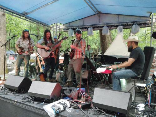 Stringdingers perform at the Backwoods Stage at Blue Ox 2024